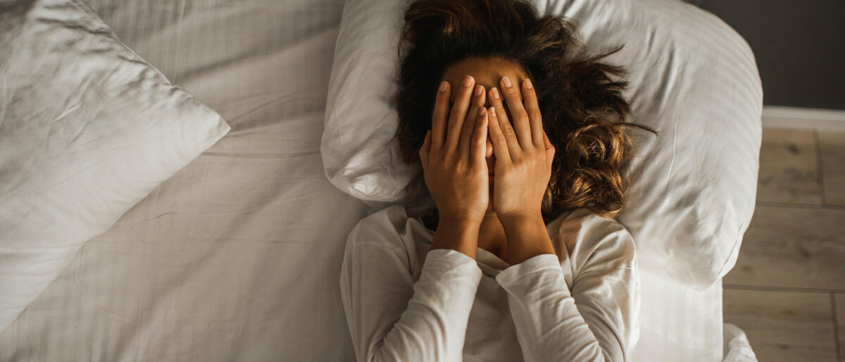 Frau liegt im Bett © Oleg Breslavtsev / Getty Images / Not known