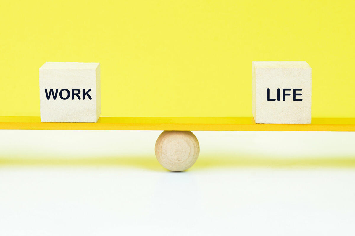 Concept of work life balance. Work life text in wooden blocks. © jayk7 / getty images